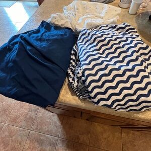 2 bassinets fitted sheets and 3 crib sheets